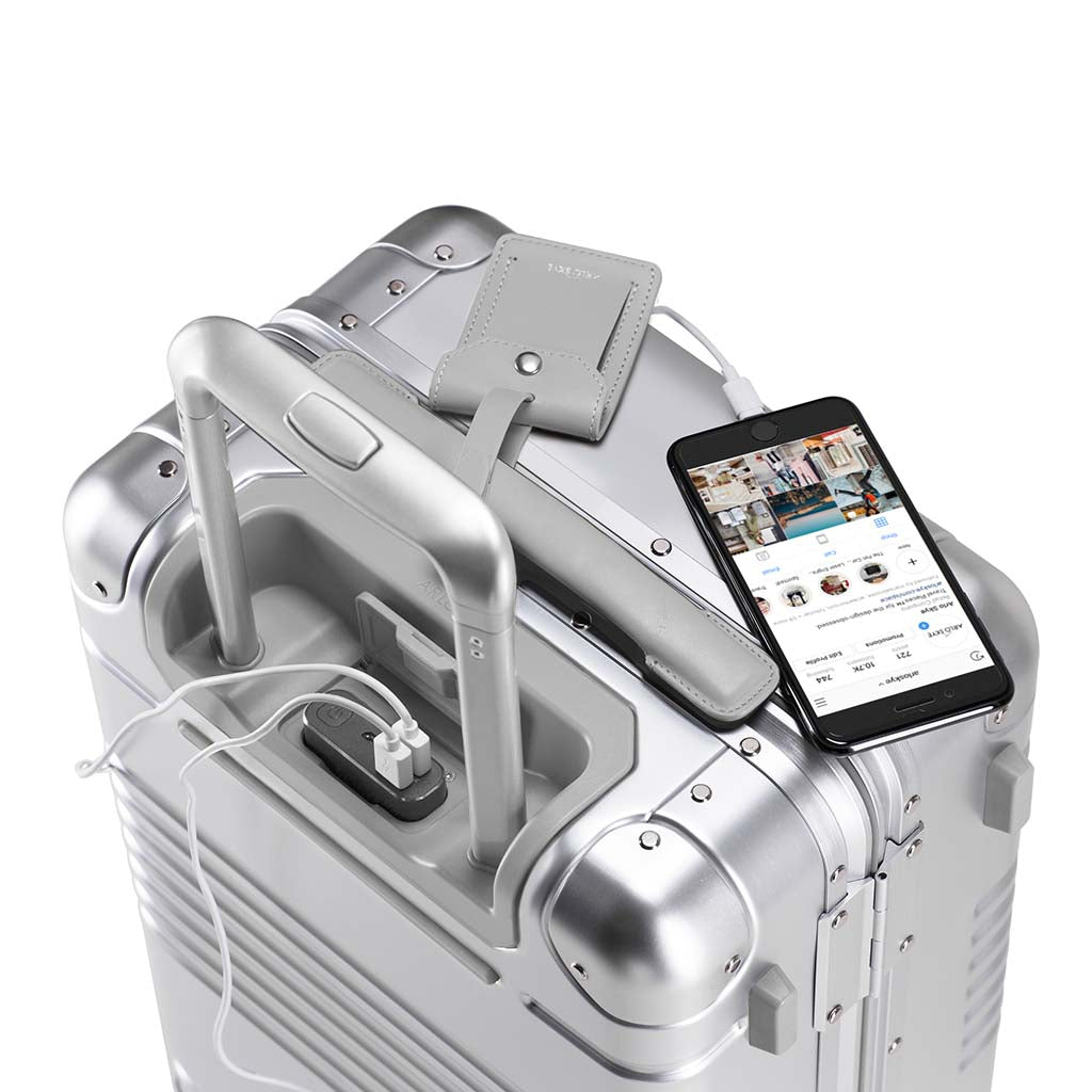 7 Best Luggage for Men - Carry-On, Checked, Toiletry Bag 3 The Frame Carry-On Max: Aluminum Edition for men with USB port